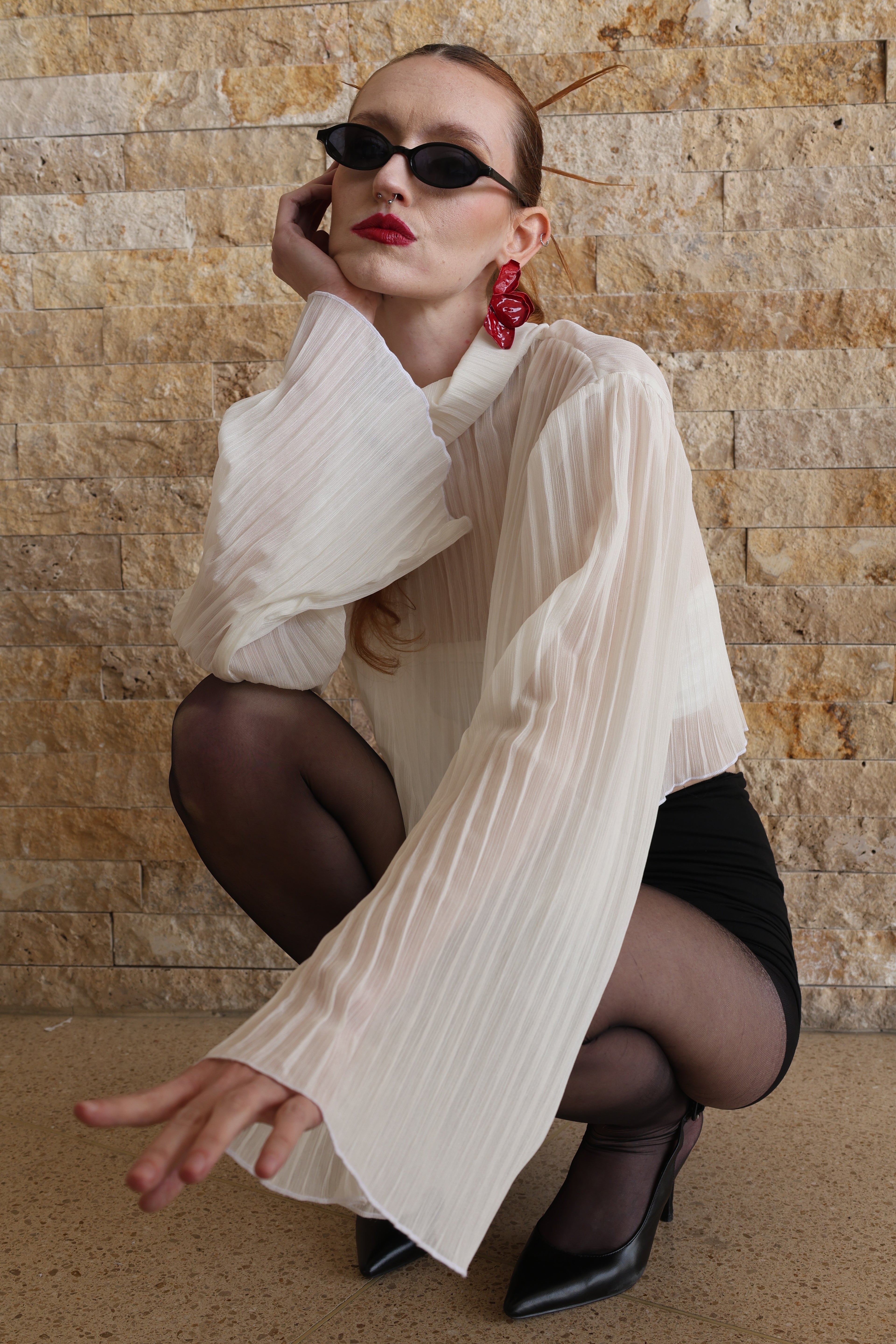 Gilded pleated top